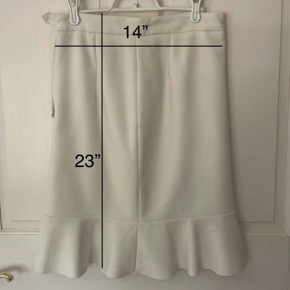 Knee length ivory ruffle bottom skirt